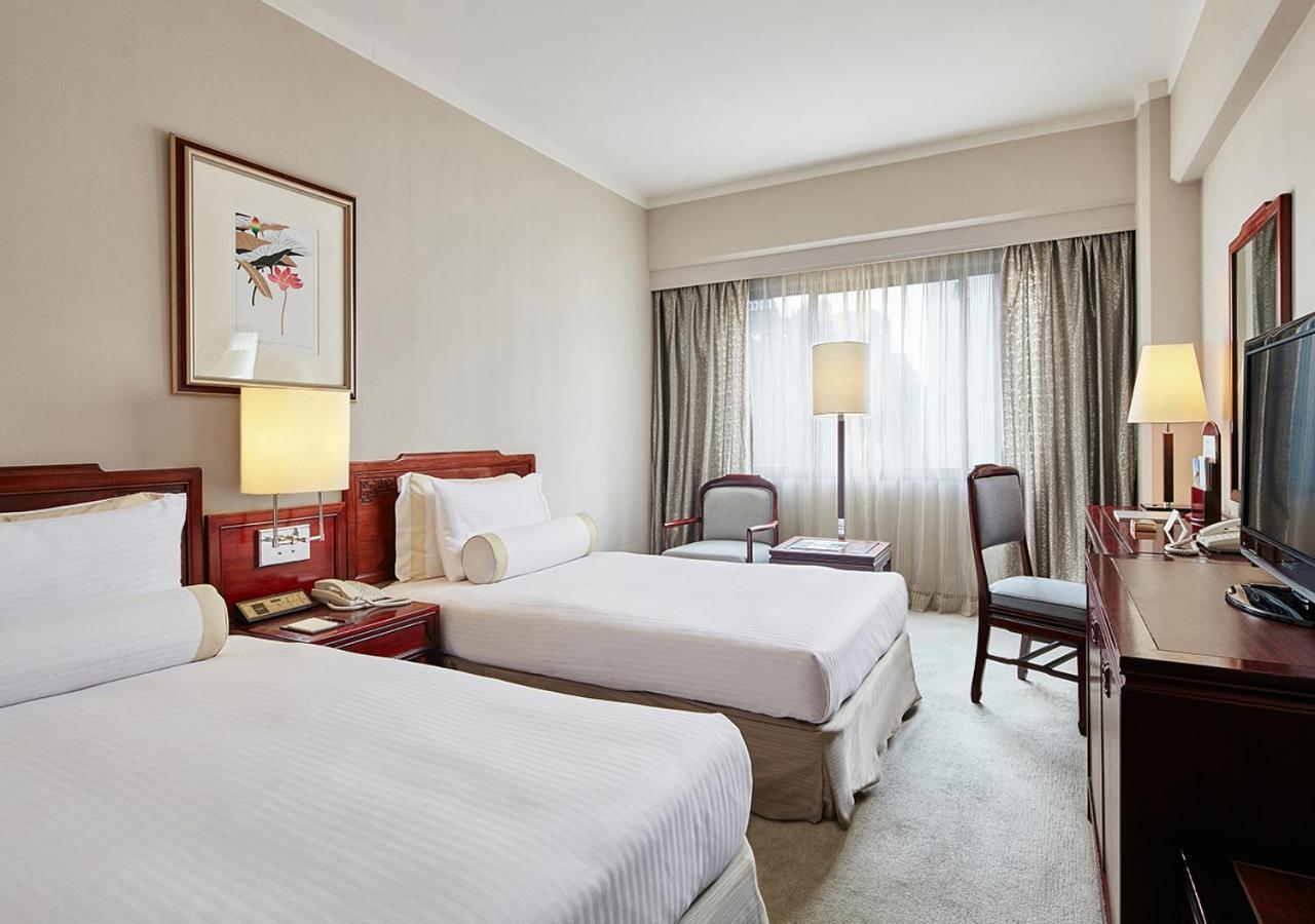 The Howard Plaza Hotel Taipei Rom bilde A room at the hotel